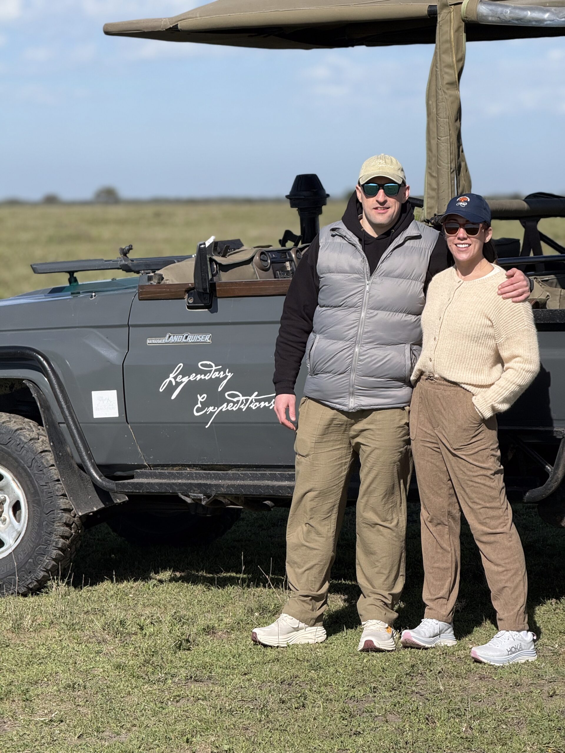 brendan and his wife in front of a truck