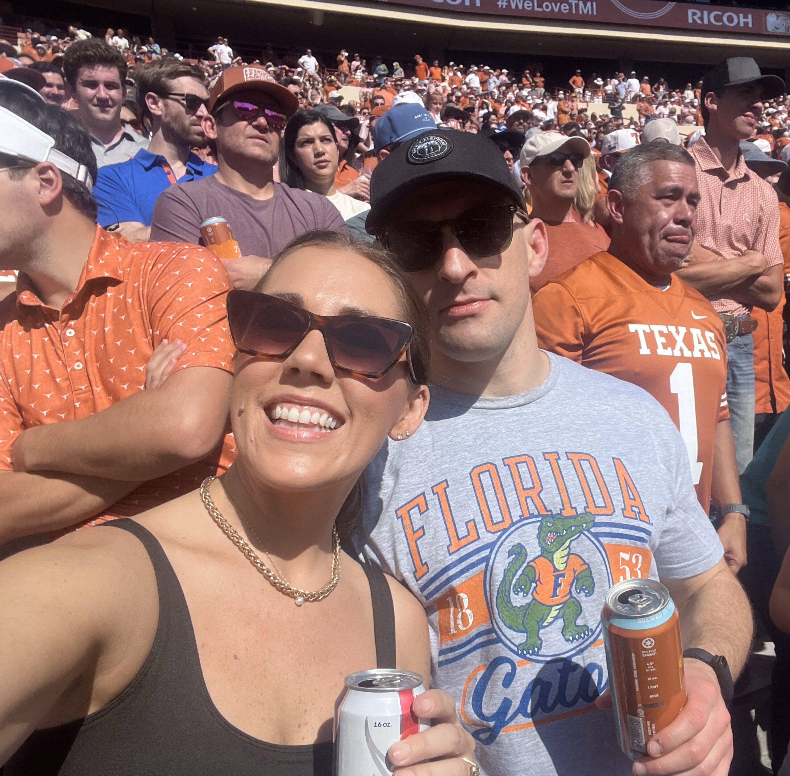 brendan and his wife at a football game